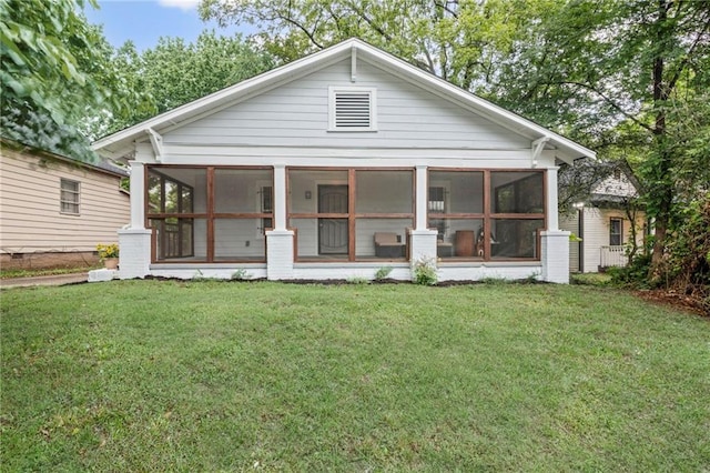 1591 Jonesboro Rd SE, Atlanta, GA 30315 - back of property featuring a sunroom and a yard