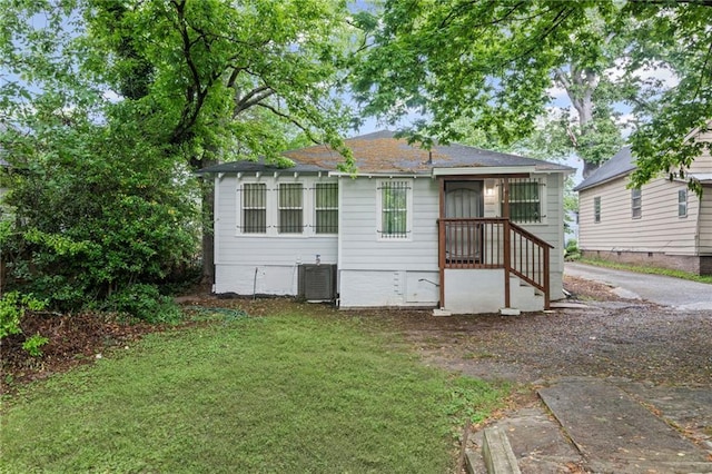 1591 Jonesboro Rd SE, Atlanta, GA 30315 - rear view of house featuring central AC unit, a yard, and crawl space