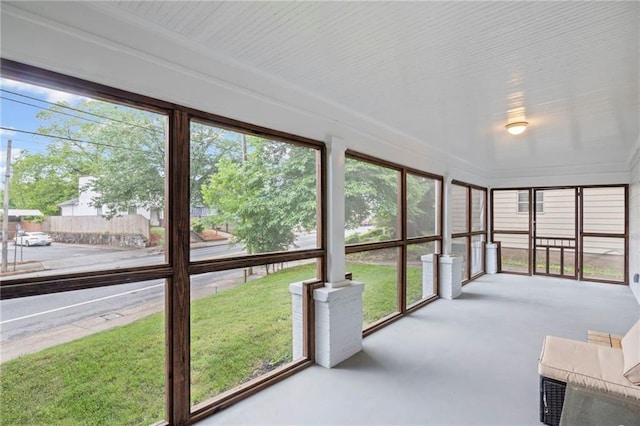 1591 Jonesboro Rd SE, Atlanta, GA 30315 - unfurnished sunroom featuring concrete floors