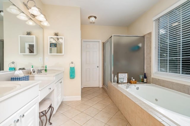 bathroom with tile floors, separate shower and tub, and dual bowl vanity