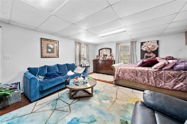 bedroom with a paneled ceiling