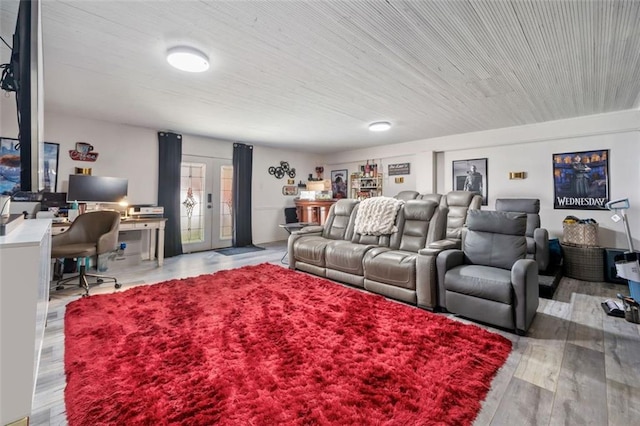 interior space featuring wood finished floors and french doors