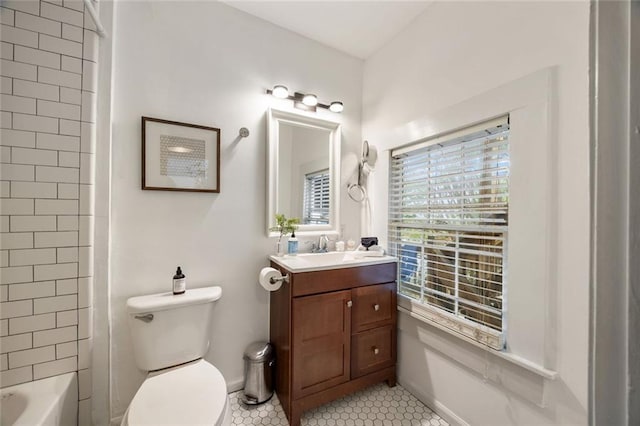 66 Howell St NE, Atlanta, GA 30312 - bathroom featuring vanity, toilet, tile patterned floors, and shower / bath combination