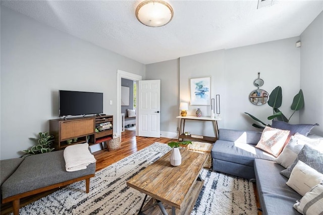 66 Howell St NE, Atlanta, GA 30312 - living area with wood finished floors
