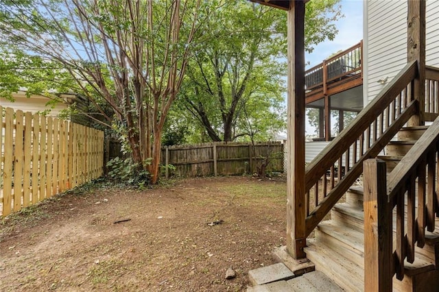 66 Howell St NE, Atlanta, GA 30312 - fenced backyard featuring stairway and a wooden deck