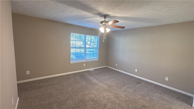 empty room featuring carpet floors, a textured ceiling, and ceiling fan