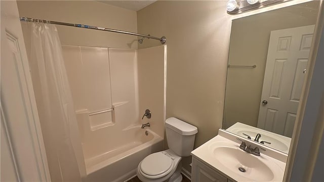 full bathroom featuring toilet, vanity, and shower / tub combo