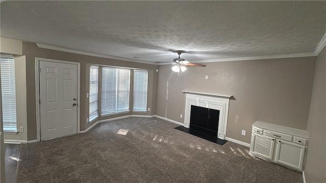 unfurnished living room featuring ceiling fan, a textured ceiling, crown molding, and dark colored carpet