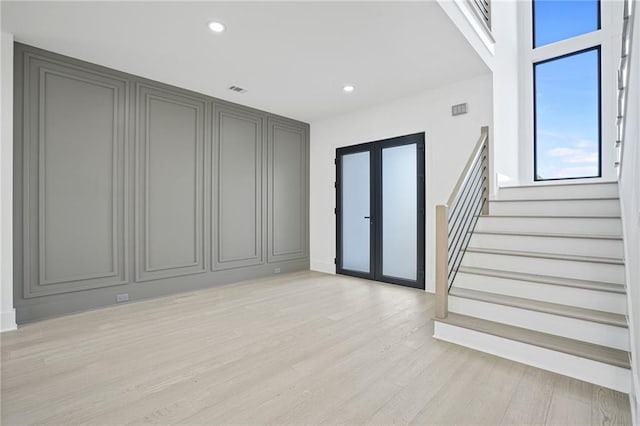 interior space with light hardwood / wood-style flooring