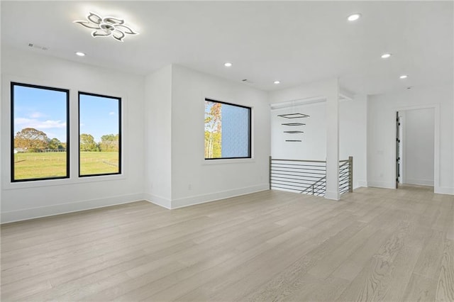 empty room with light wood-type flooring