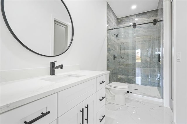 bathroom with toilet, a shower with shower door, and vanity