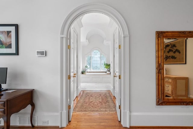 hallway featuring light wood-type flooring