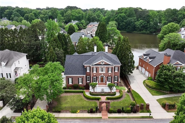 aerial view featuring a residential view and a water view