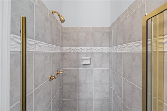 full bathroom featuring a shower stall