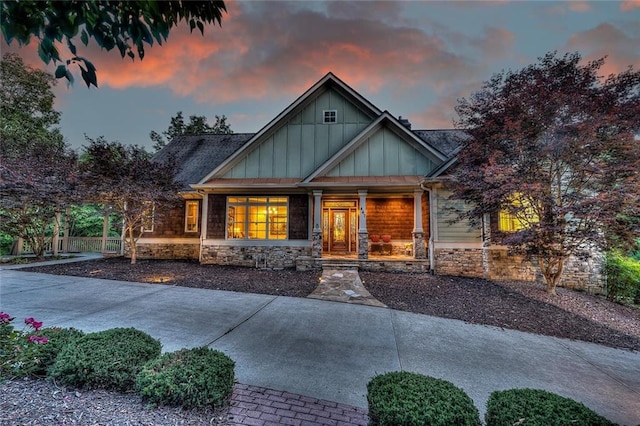 craftsman-style house with a porch and board and batten siding