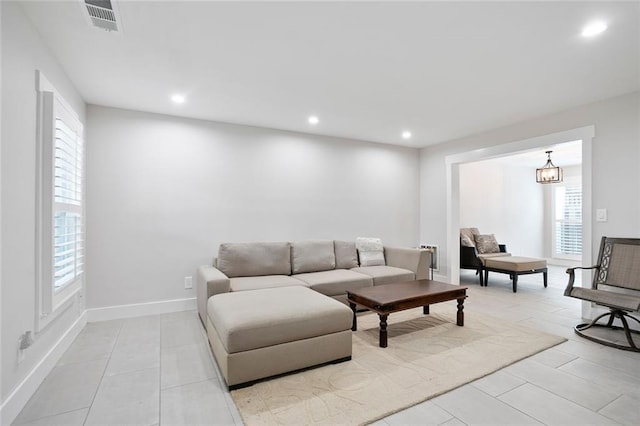 4167 Oakwood Way, Duluth, GA 30096 - living room with recessed lighting, light tile patterned flooring, and baseboards