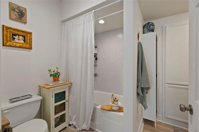 3777 Peachtree Rd NE Unit 1227, Brookhaven, GA 30319 - bathroom with shower / bathtub combination with curtain and recessed lighting