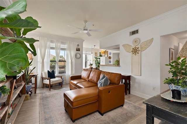 3777 Peachtree Rd NE Unit 1227, Brookhaven, GA 30319 - living room with ornamental molding, ceiling fan, and wood finished floors