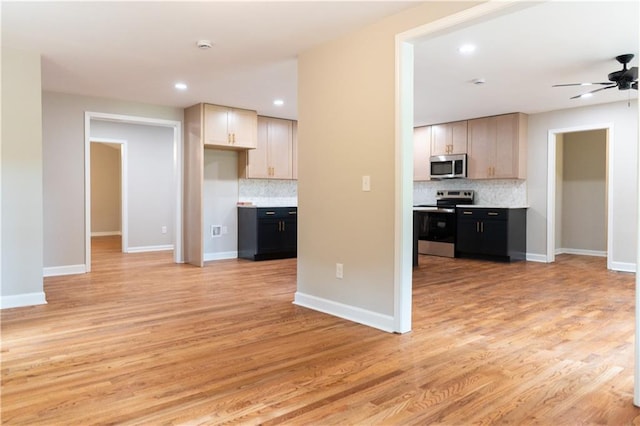 45 Driskell Ave, Mableton, GA 30126 - kitchen featuring appliances with stainless steel finishes, decorative backsplash, a ceiling fan, light wood finished floors, and recessed lighting