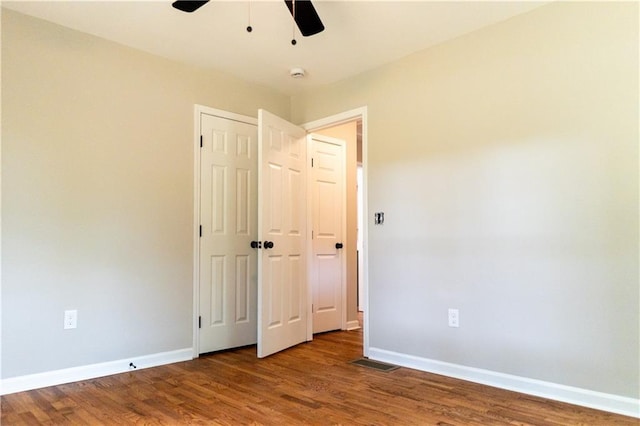 45 Driskell Ave, Mableton, GA 30126 - unfurnished bedroom with wood finished floors, a closet, and ceiling fan