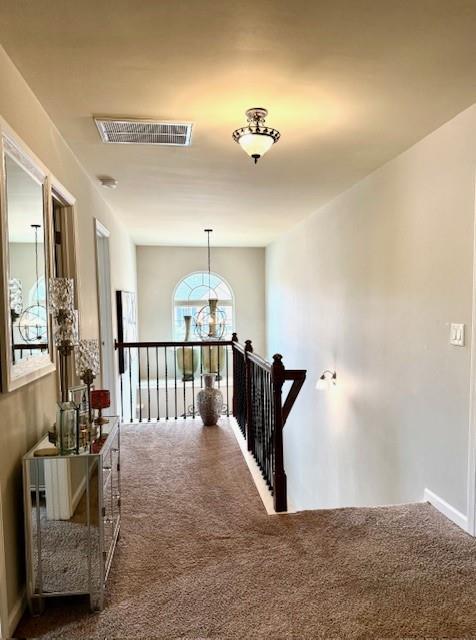 558 Hideaway Dr, Jonesboro, GA 30238 - hallway with an upstairs landing and carpet flooring