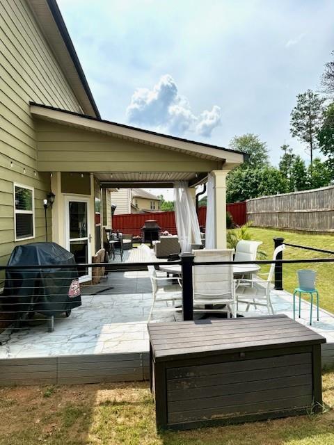 558 Hideaway Dr, Jonesboro, GA 30238 - view of patio / terrace featuring a deck, outdoor dining area, and grilling area