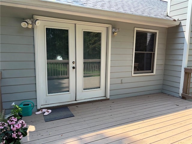 403 Hickory Walk, Woodstock, GA 30188 - doorway to property featuring french doors, a shingled roof, and a deck