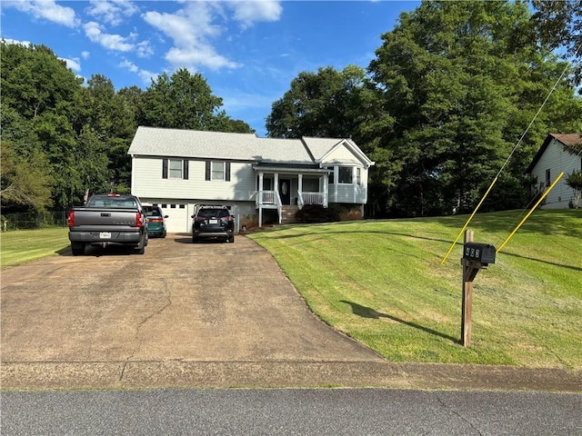 403 Hickory Walk, Woodstock, GA 30188 - view of front of property with a front yard, a garage, and driveway