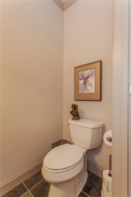 bathroom with tile patterned floors and toilet