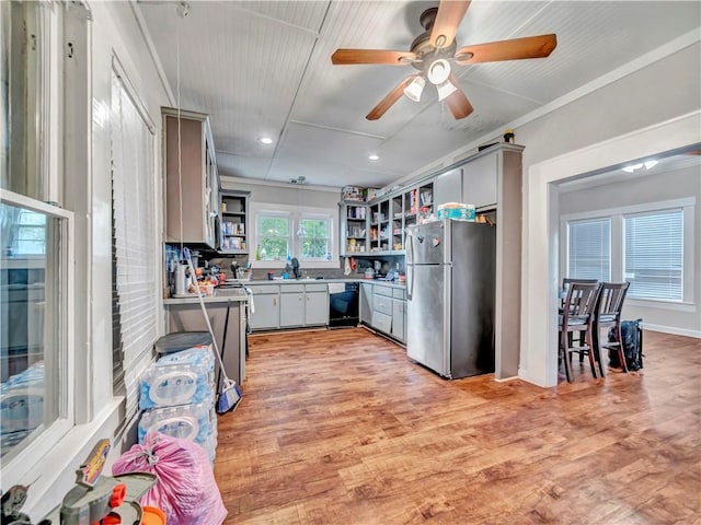 kitchen featuring freestanding refrigerator, open shelves, gray cabinets, dishwasher, and light wood-style flooring
