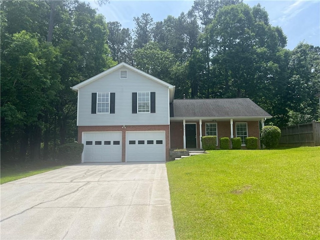 6541 Lazy Creek Ct, Lithonia, GA 30058 - tri-level home with concrete driveway, brick siding, a porch, and an attached garage