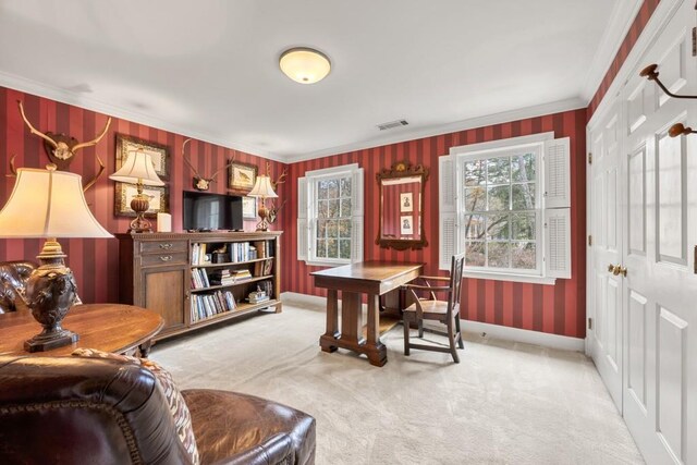 office space featuring light carpet and crown molding