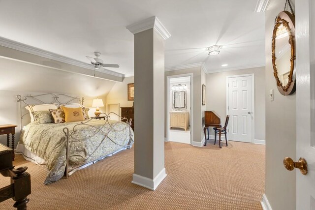 bedroom featuring ornate columns, ensuite bathroom, carpet flooring, ceiling fan, and crown molding