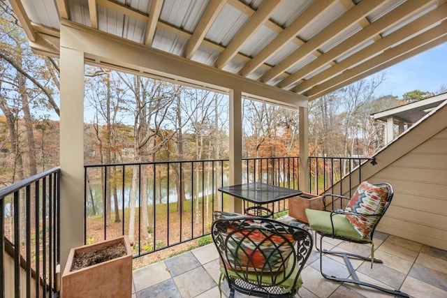 balcony featuring a water view