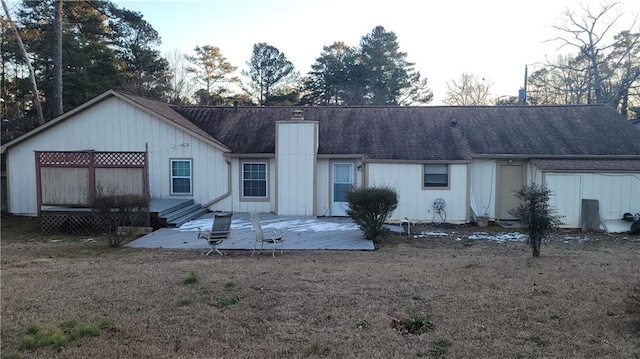 back of property featuring a patio