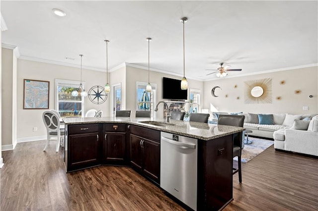 kitchen featuring a center island with sink, sink, dishwasher, and dark wood-type flooring