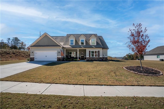 cape cod house with a porch, a front lawn, and a garage