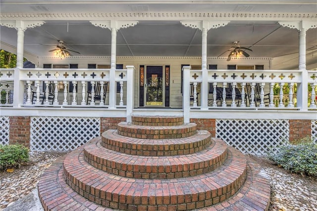 doorway to property with ceiling fan and a porch