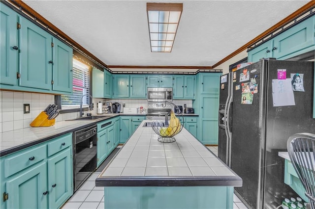 kitchen featuring ornamental molding, tile countertops, black appliances, sink, and light tile patterned flooring