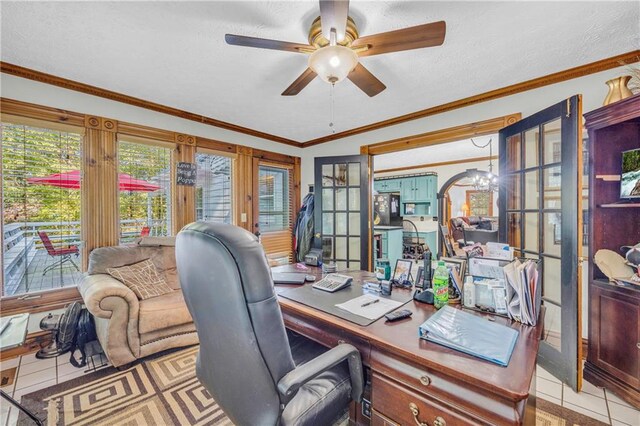 office with ceiling fan with notable chandelier, a textured ceiling, ornamental molding, and light tile patterned flooring