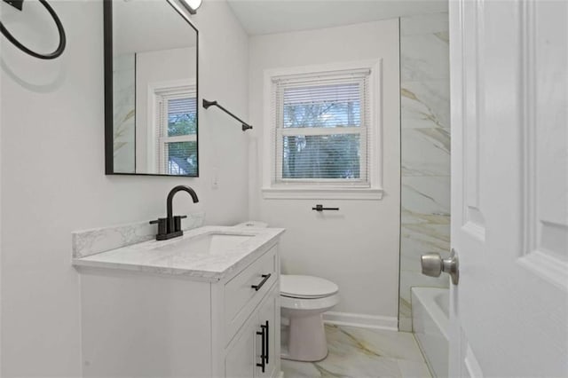 full bathroom with vanity, toilet, and  shower combination