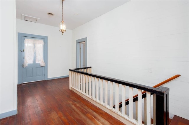 entryway with dark hardwood / wood-style floors