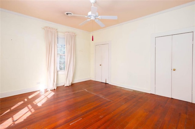 unfurnished room with crown molding, wood-type flooring, and ceiling fan