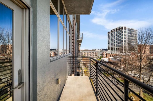 balcony featuring a city view