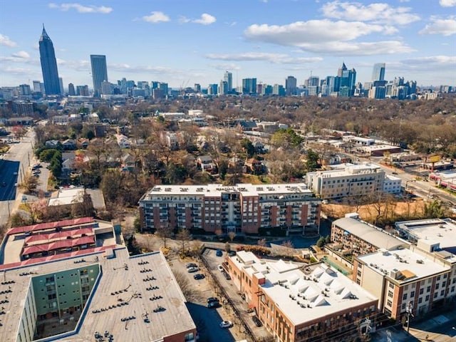 birds eye view of property with a city view
