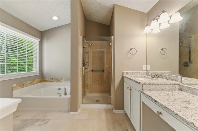 2154 Marne Gln NW, Kennesaw, GA 30152 - full bathroom featuring a shower stall, vanity, a bath, a textured ceiling, and tile patterned floors