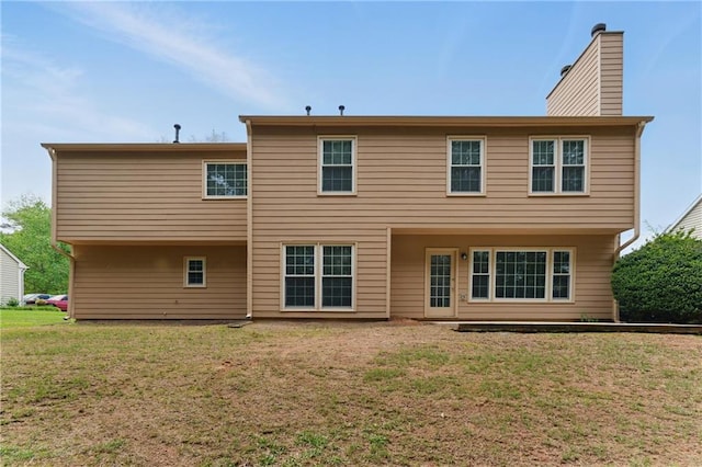 2154 Marne Gln NW, Kennesaw, GA 30152 - rear view of house featuring a yard and a chimney