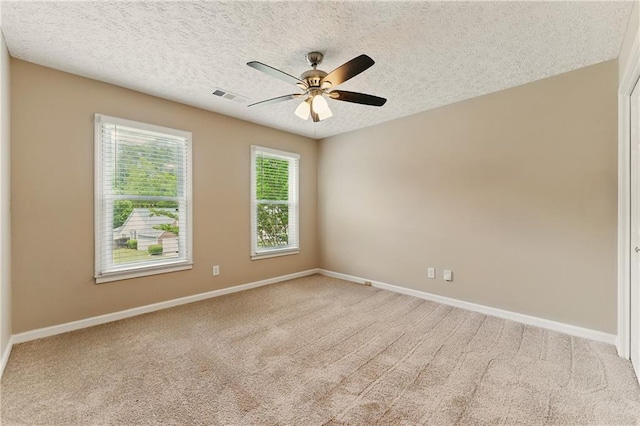 2154 Marne Gln NW, Kennesaw, GA 30152 - unfurnished room with ceiling fan, carpet floors, baseboards, and a textured ceiling