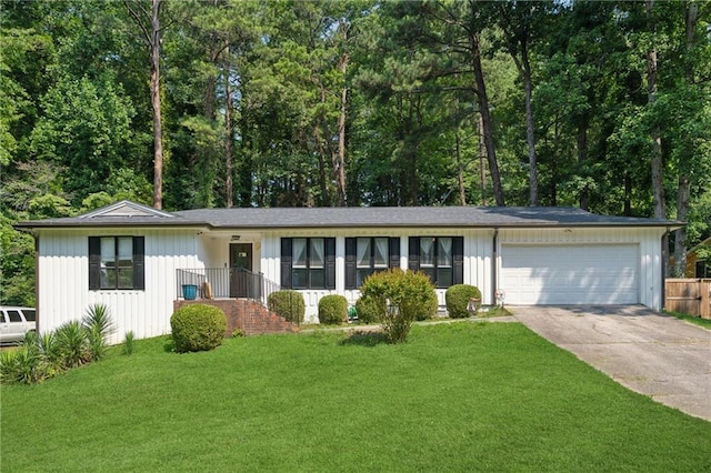5360 Fieldgreen Dr, Stone Mountain, GA 30088 - ranch-style home featuring driveway, a garage, a front lawn, and board and batten siding