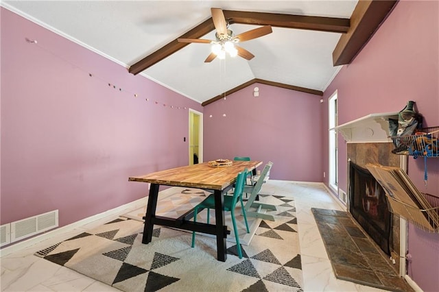 5360 Fieldgreen Dr, Stone Mountain, GA 30088 - dining space featuring light marble finish floors, a tiled fireplace, ceiling fan, and ornamental molding